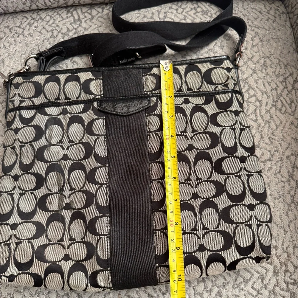Coach Signature Stripe File Bag features a black and gray monogram canvas